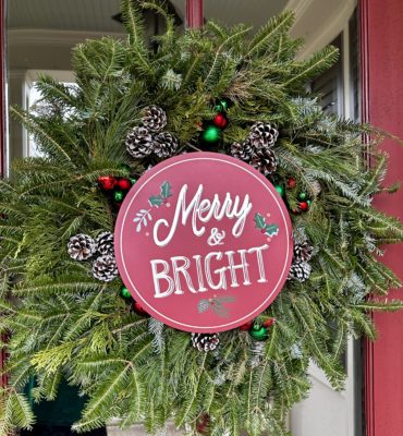 Christmas wreath on a front door.